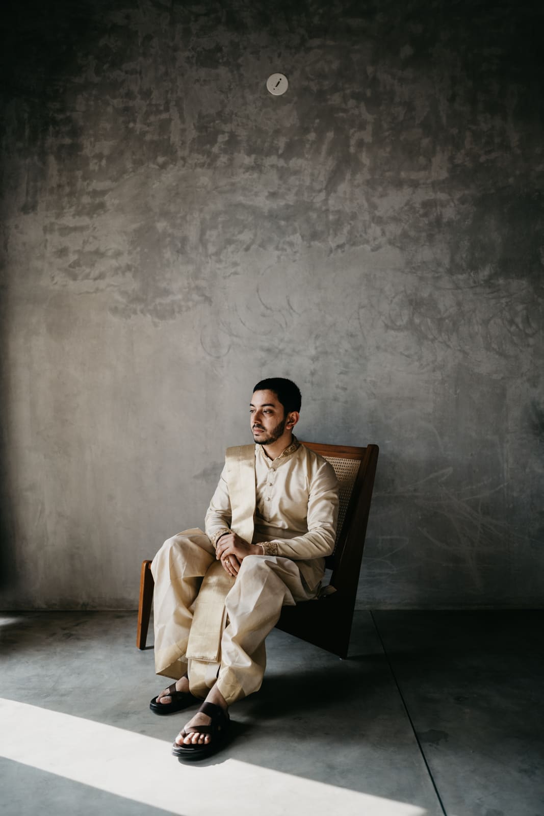 Nikhil seated for his portrait
